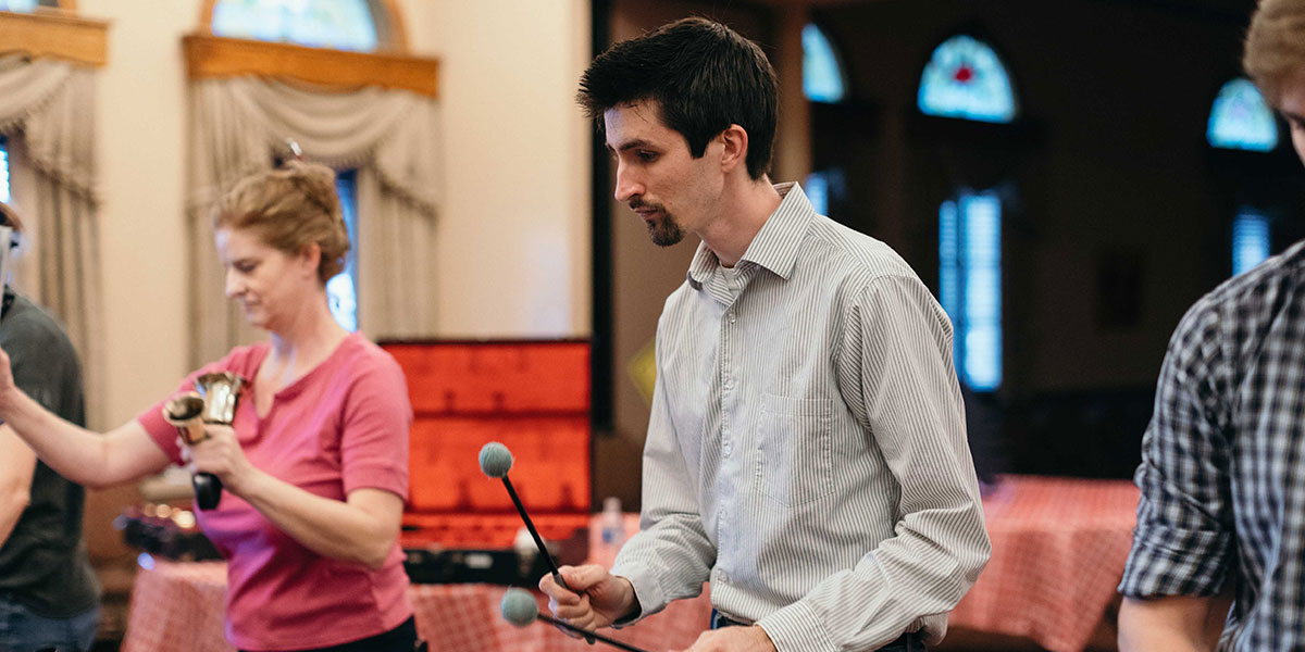 Alex playing handbells